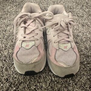 Girl’s New Balance pink sneakers